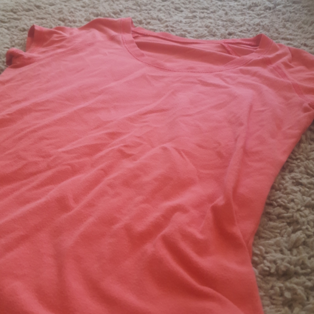 peach / pink shirt